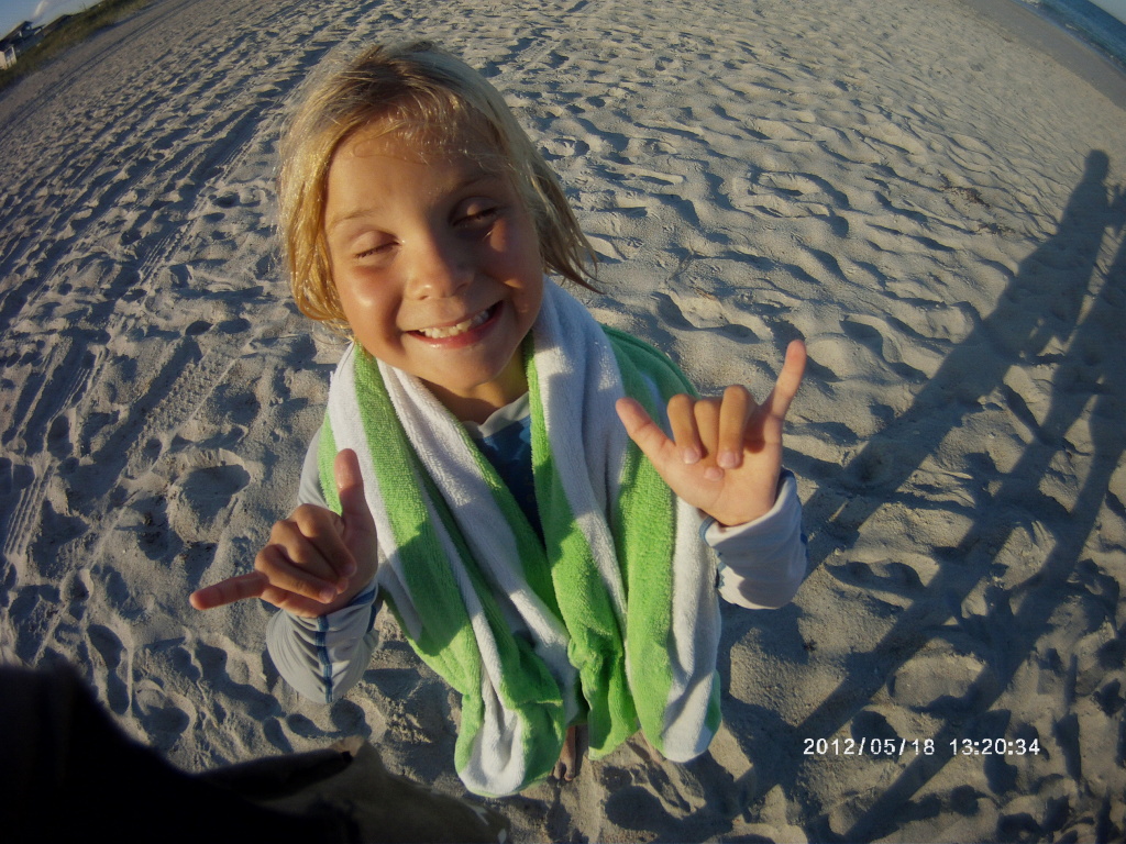 DCIM100MEDIA Kid smiling at beach